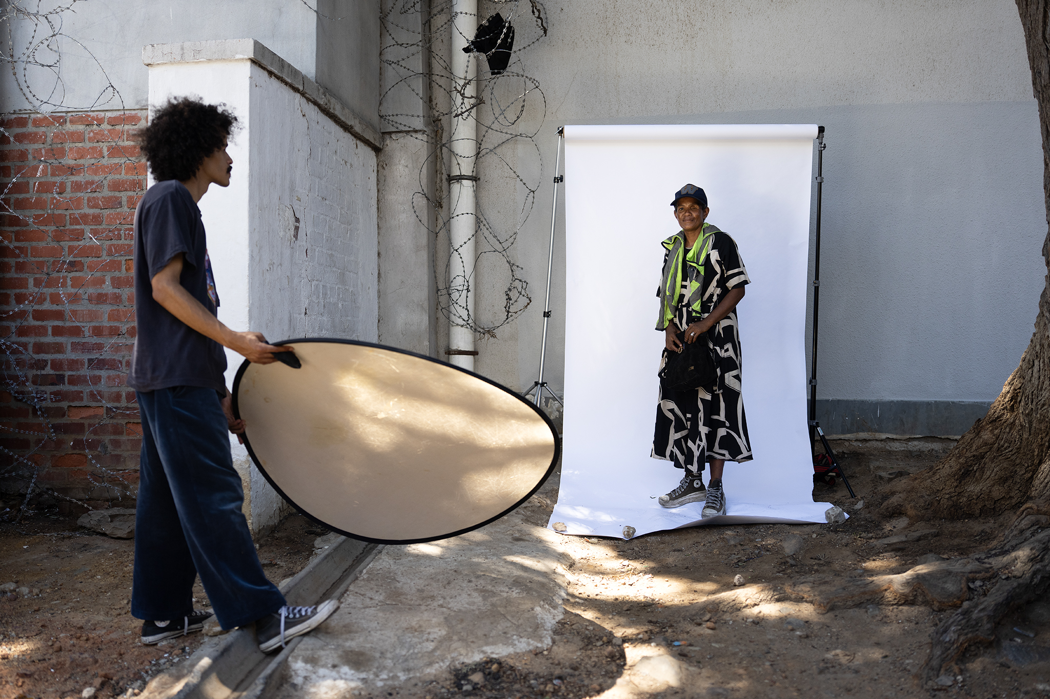 Behind-the-scenes: Alison Thomas being photographed in an outdoor portrait studio