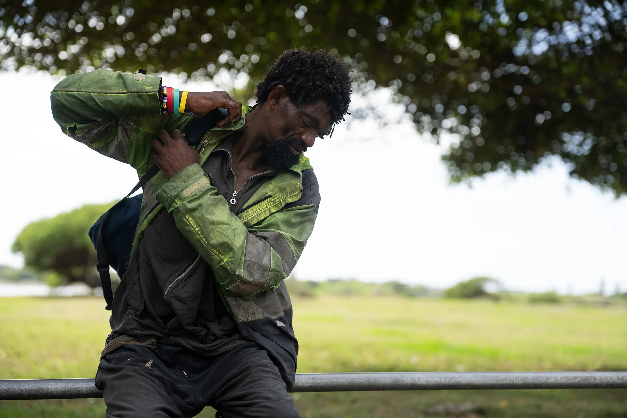 Graham Morris sits on a railing