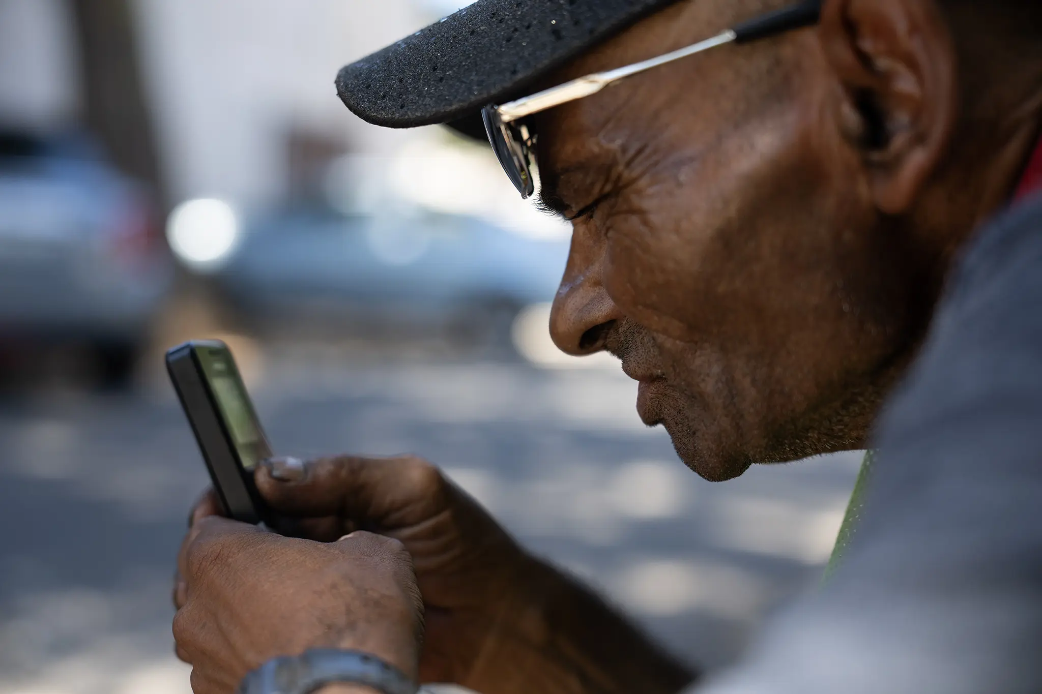 Behind-the-scenes: Jeremy Williams being photographed in an outdoor portrait studio