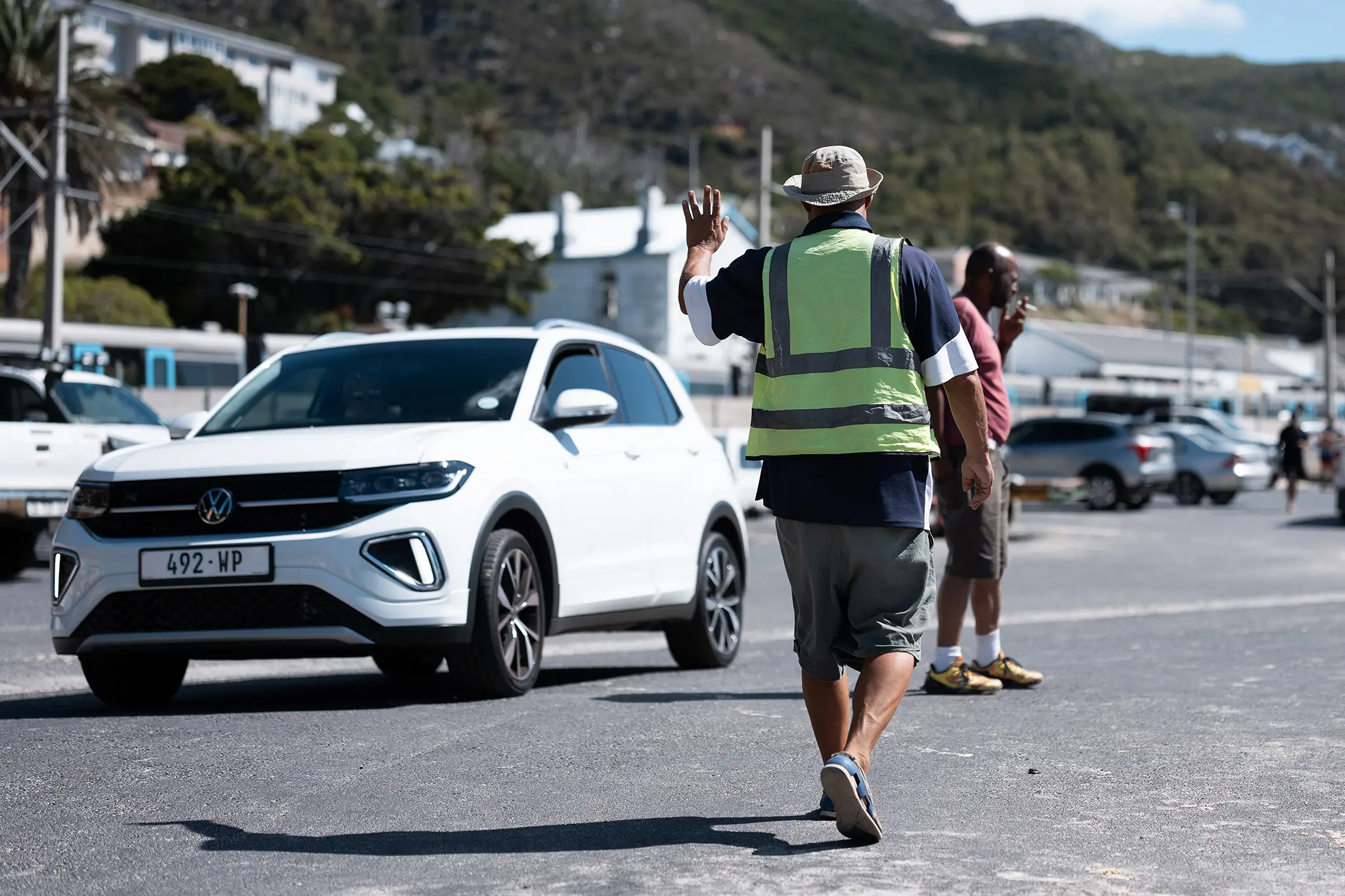 Quentin Oberholster takes a break while working as a car guard.